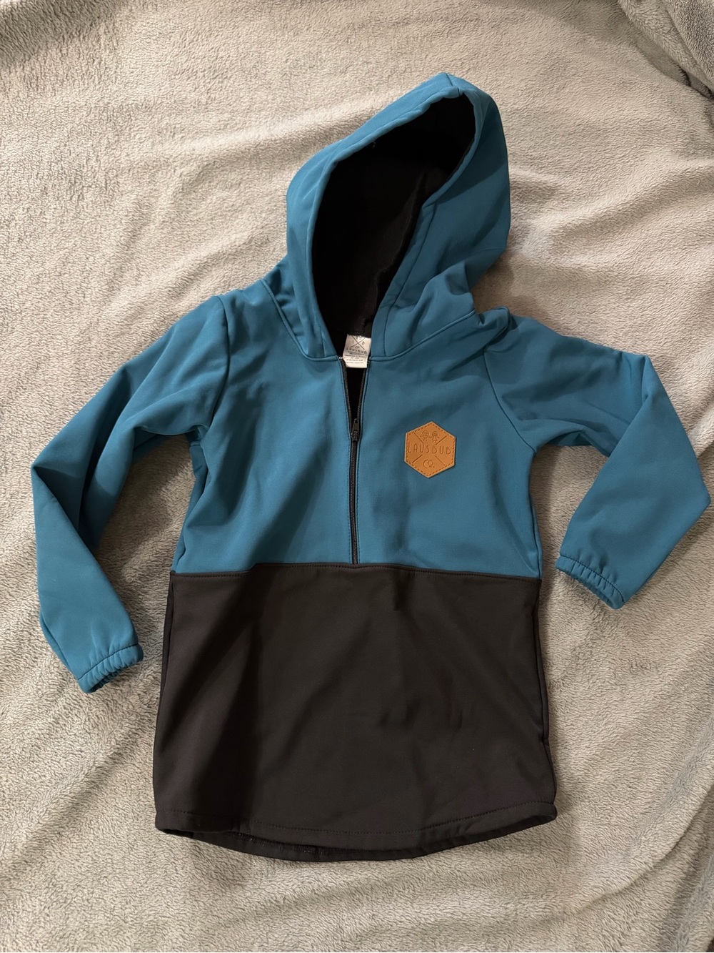 Lausbub Co. teal and black color-blocked kids jacket